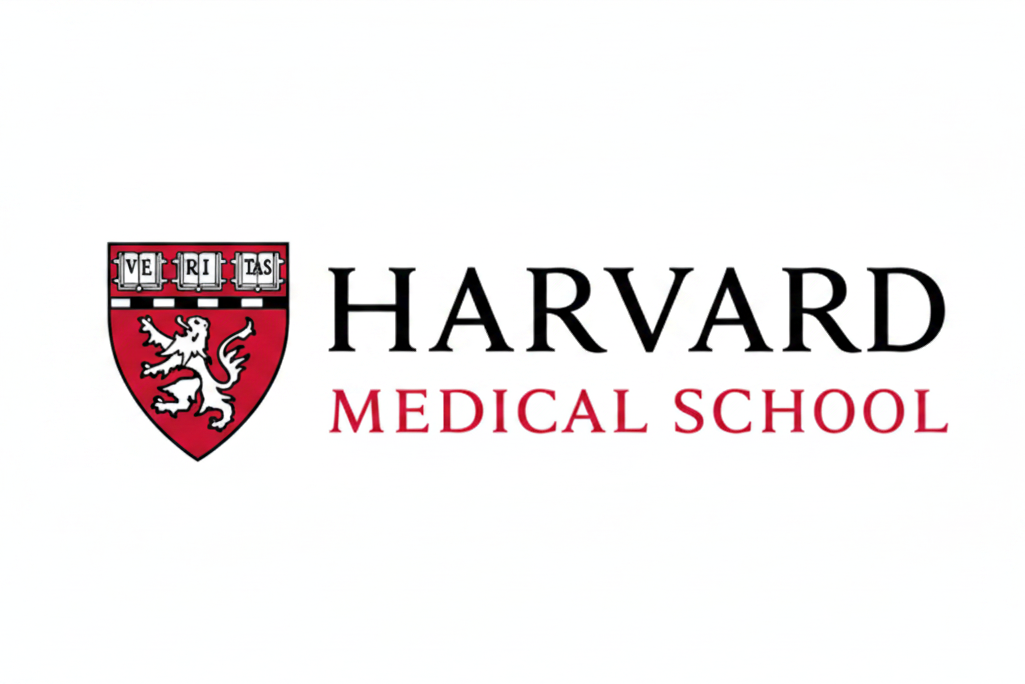 Harvard Medical School logo with a red and white shield on the left, large black 'HARVARD' text, and red 'MEDICAL SCHOOL' text on a white background.